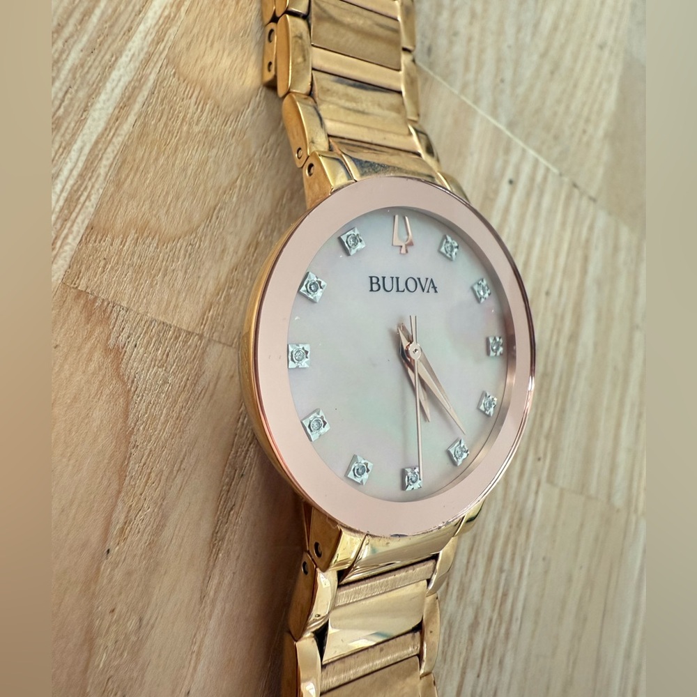 Bulova ladies pink mother of pearl rose gold tone dress watch NEW BATTERY